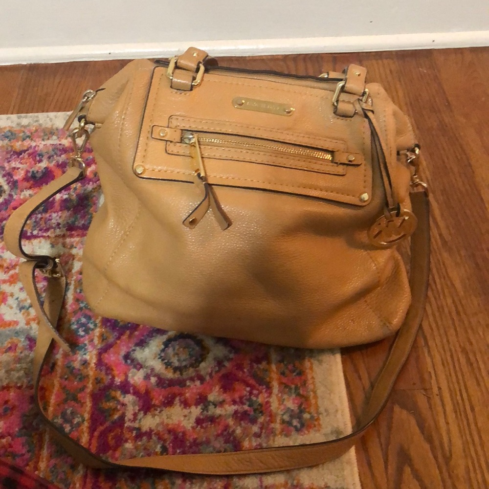 Authentic Michael Kors purse. Very well loved